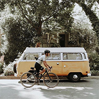 "man riding a bike on the residential streets of sacramento"