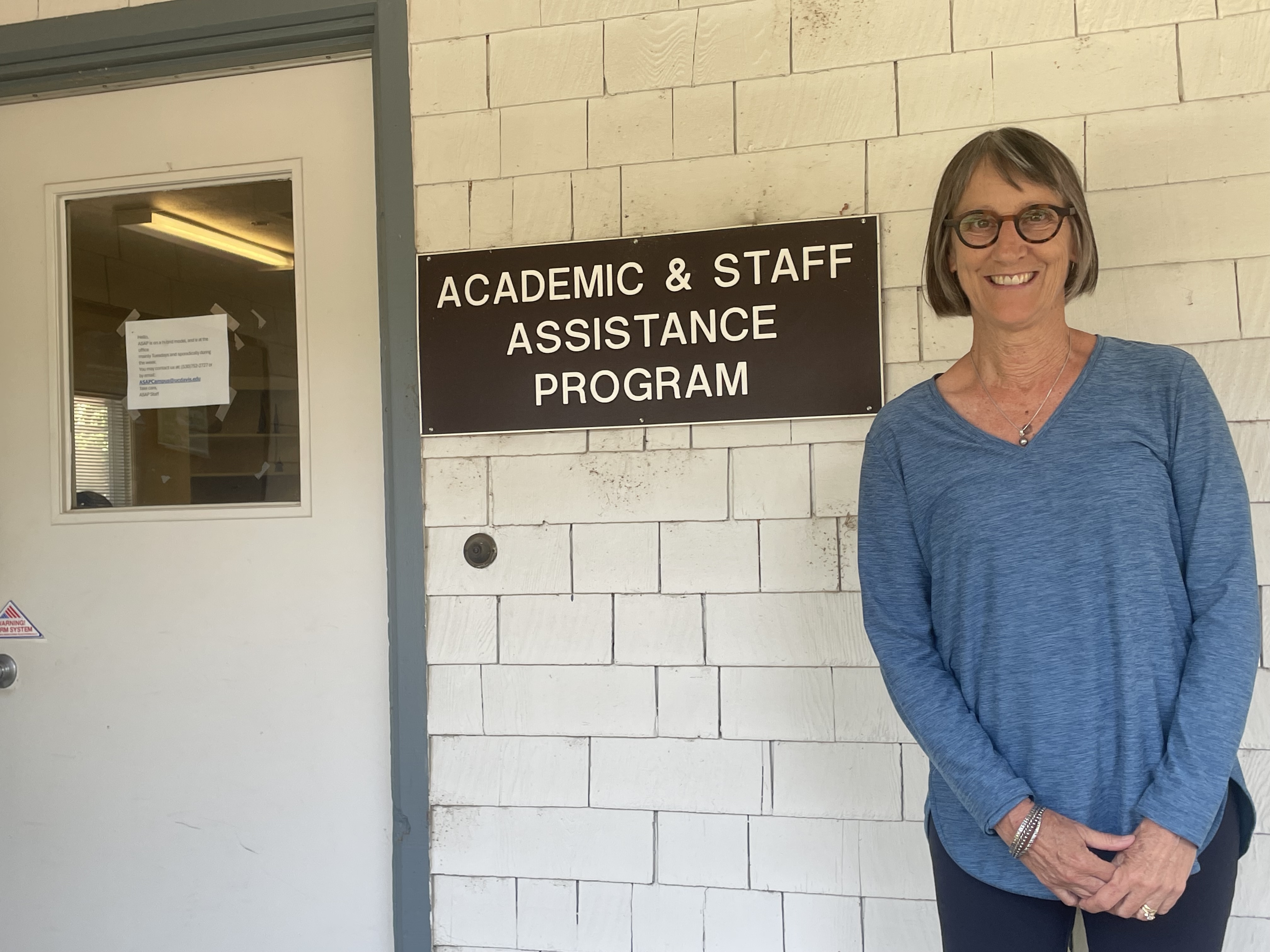 Carol Kirshnit in front of ASAP's Guilbert House offices