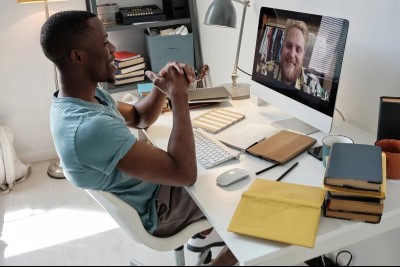employee talking on computer desktop