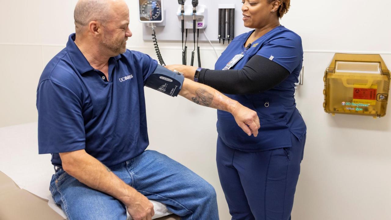 nurse taking blood pressure
