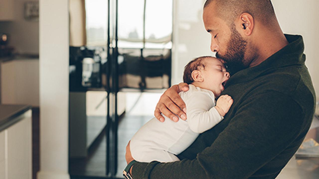 man with baby