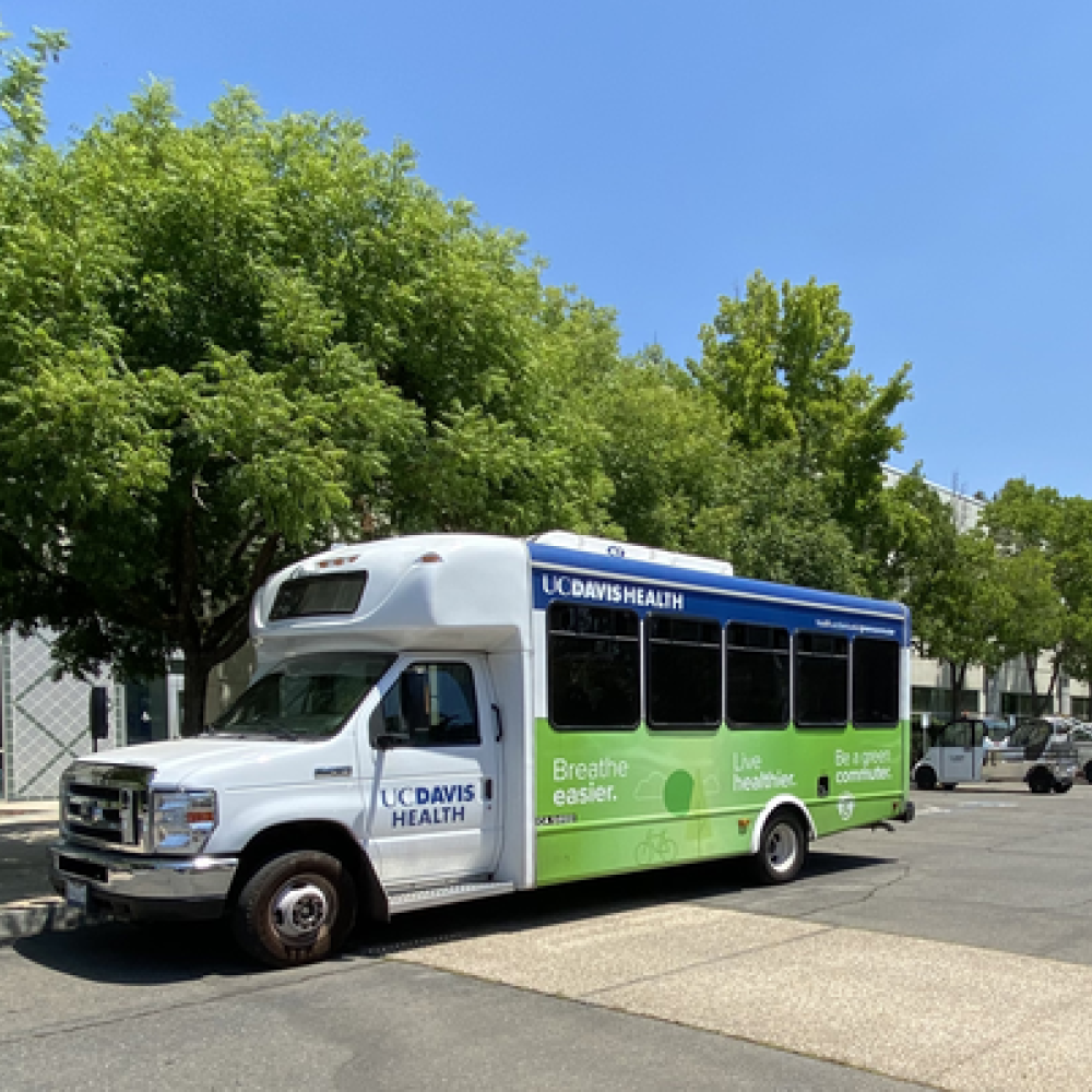 shuttle in front of trees
