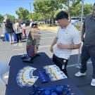 Employee spinning the prize wheel to win a prize